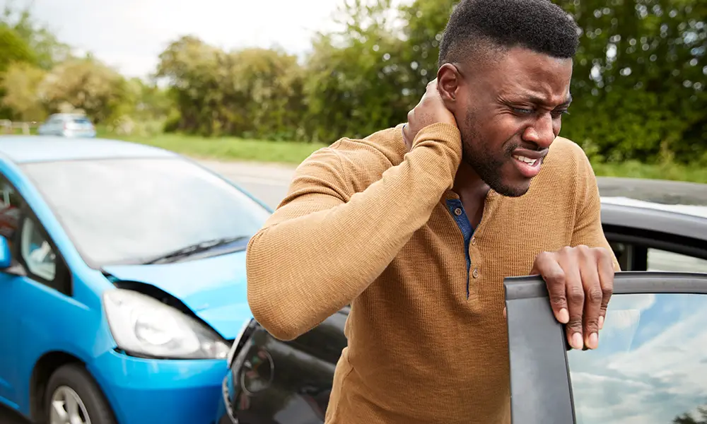 man injured with whiplash from car accident - collinsville il