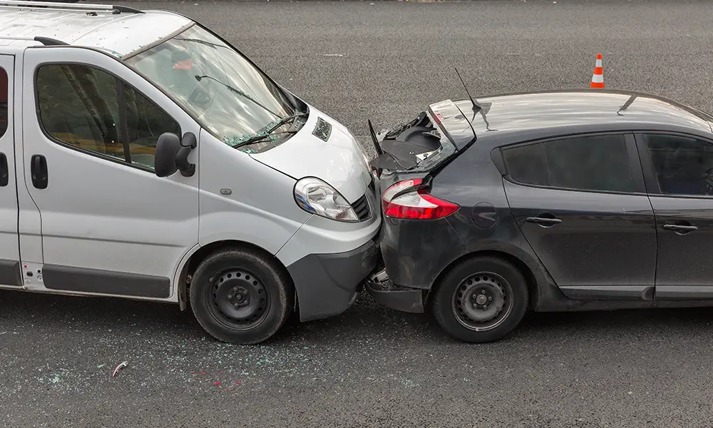 service van hitting a car from behind causing a rear-end collision - rear-end collision lawyer collinsville il