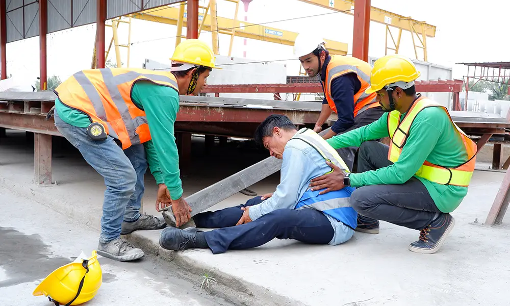 construction worker injures foot from construction beam - could be entitled to workers compensation